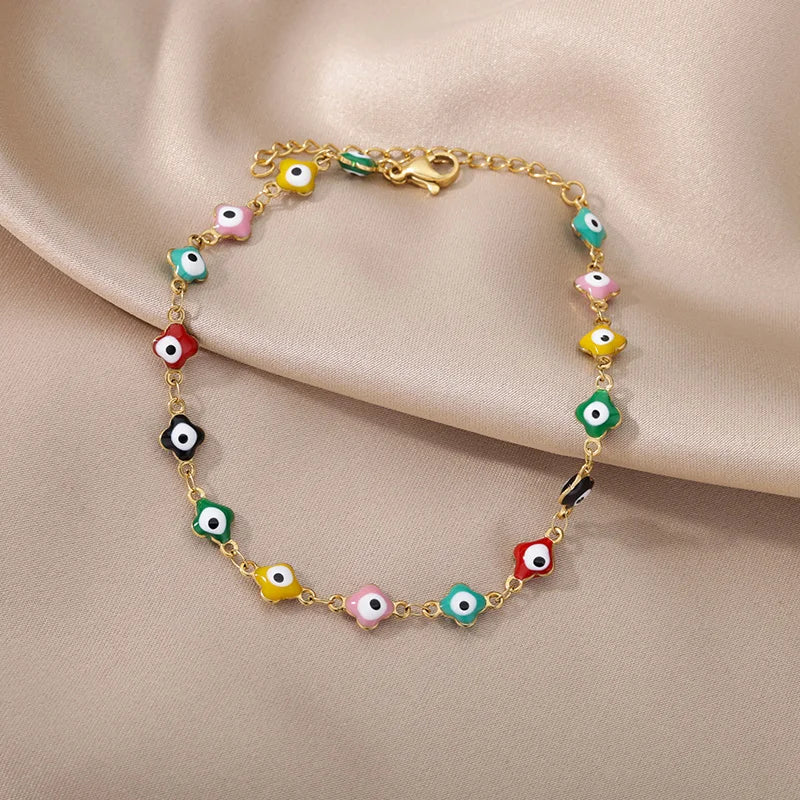 Chaîne de Cheville Dorée avec Croix et Pierres Zirconium