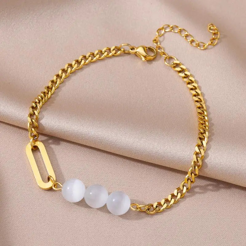 Chaîne de Cheville Dorée avec Croix et Pierres Zirconium