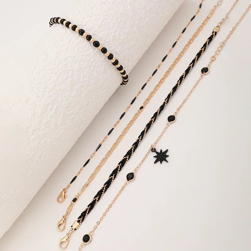 Chaîne de Cheville Multi-rangs Dorée et Noire