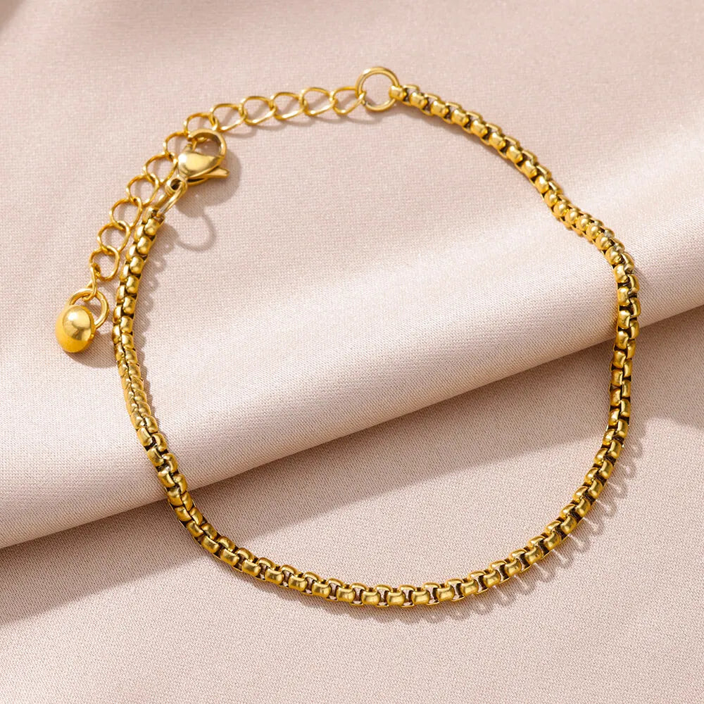 Chaîne de Cheville Dorée avec Croix et Pierres Zirconium
