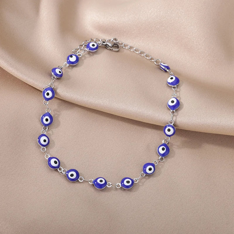 Chaîne de Cheville Dorée avec Croix et Pierres Zirconium