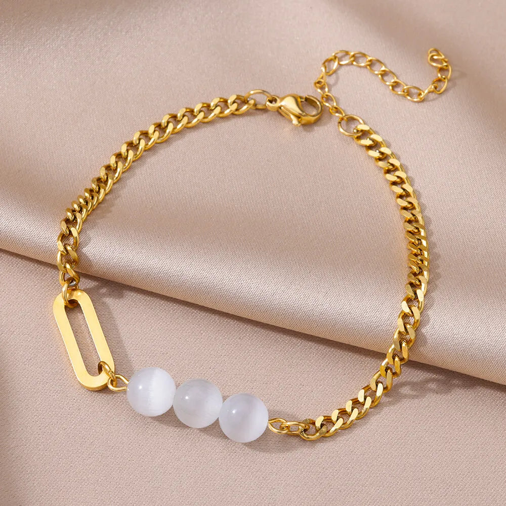 Chaîne de Cheville Dorée avec Croix et Pierres Zirconium