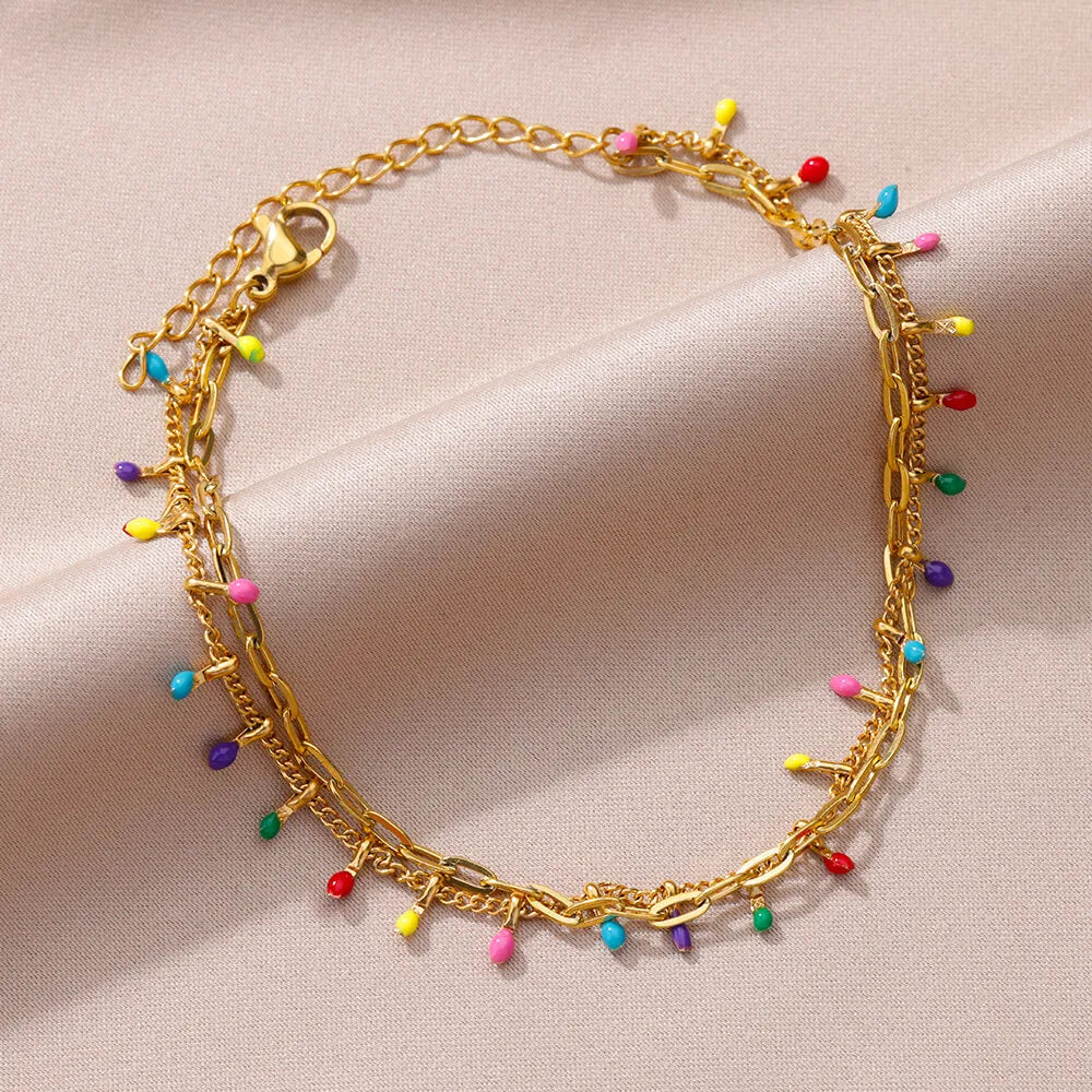 Chaîne de Cheville Dorée avec Croix et Pierres Zirconium