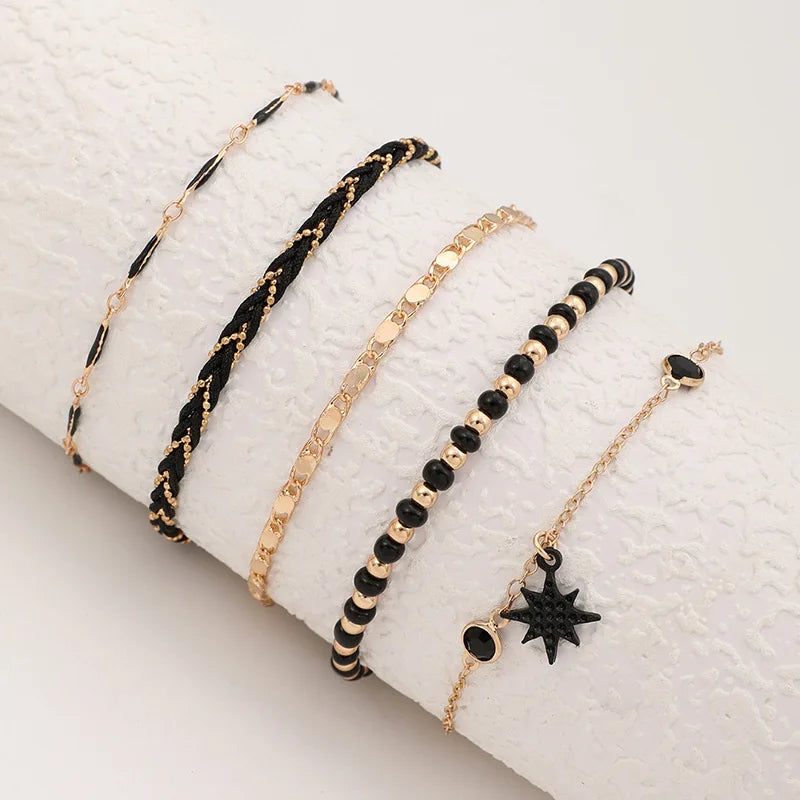 Chaîne de Cheville Multi-rangs Dorée et Noire