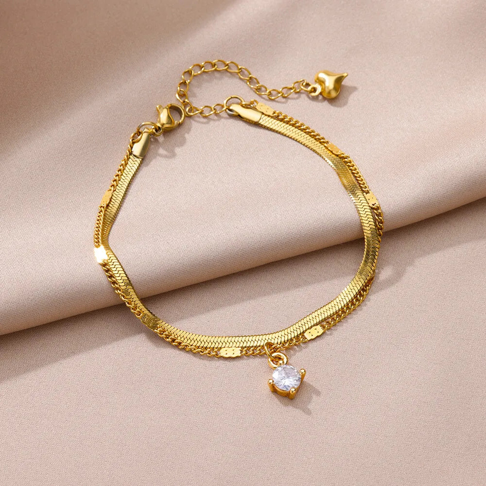 Chaîne de Cheville Dorée avec Croix et Pierres Zirconium