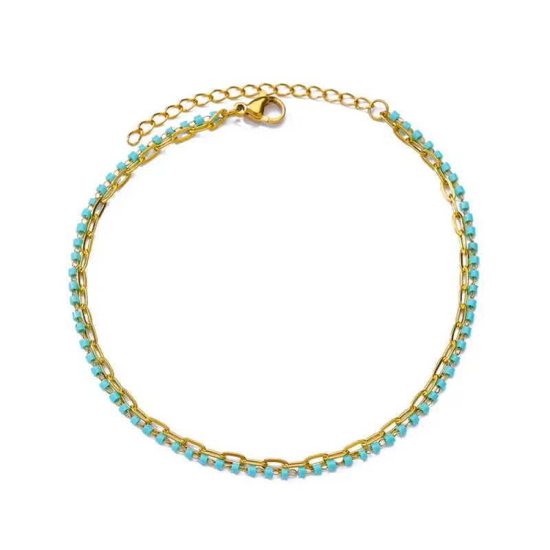 Chaîne de Cheville Dorée avec Croix et Pierres Zirconium