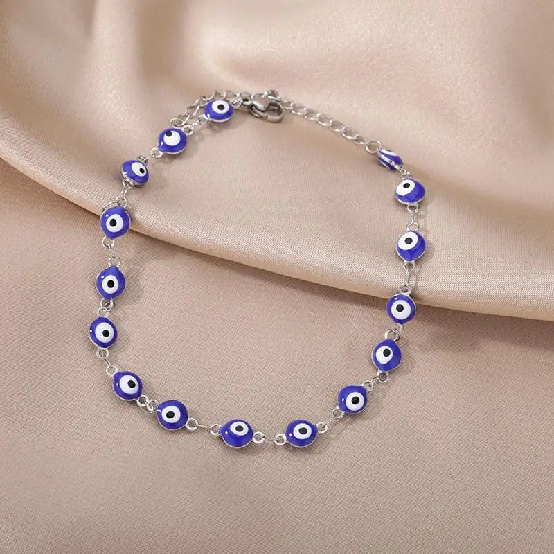 Chaîne de Cheville Dorée avec Croix et Pierres Zirconium