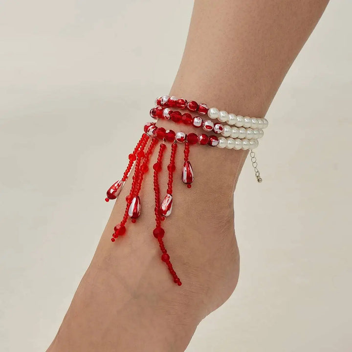 Bracelet de Cheville avec Perles Rouges et Blanches à Pampilles
