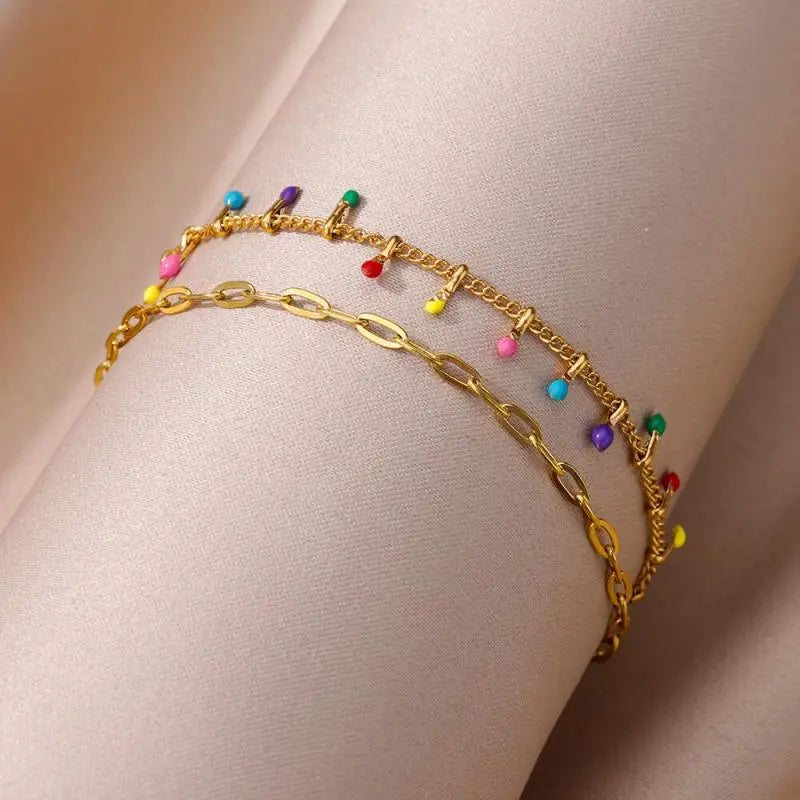 Chaîne de Cheville Dorée avec Croix et Pierres Zirconium