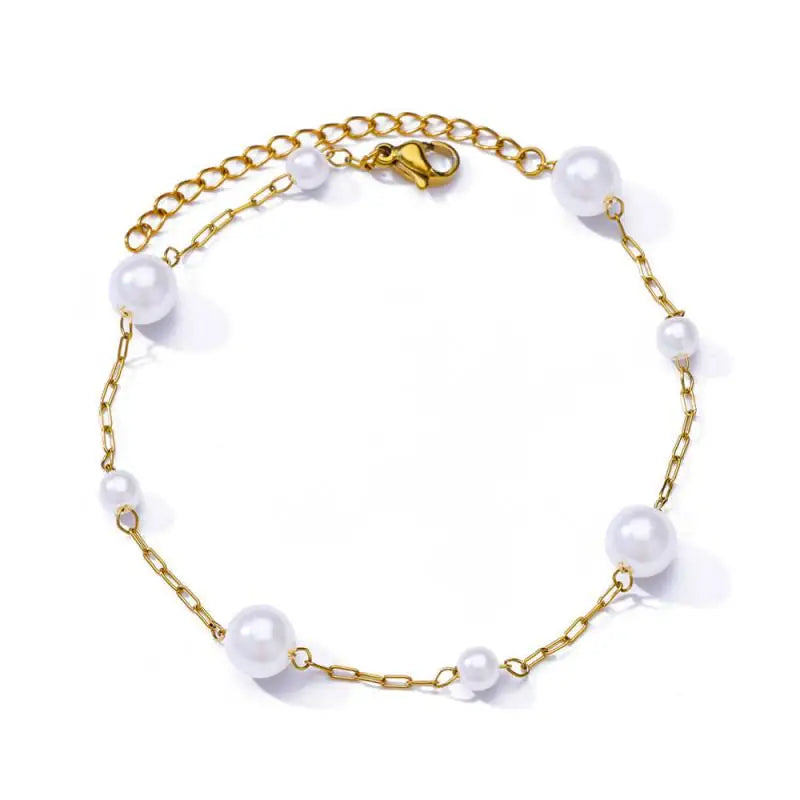 Chaîne de Cheville Dorée avec Croix et Pierres Zirconium