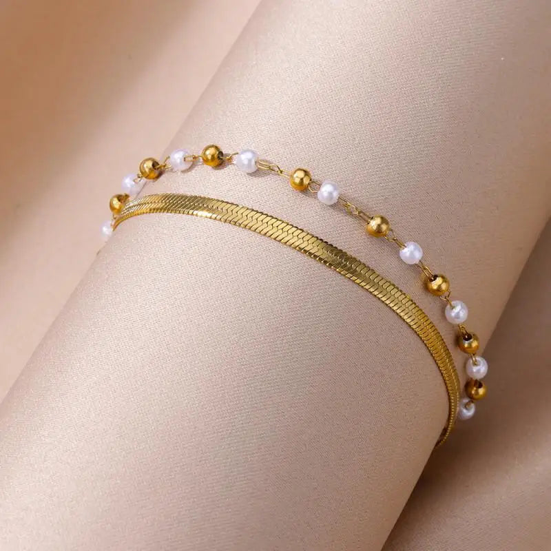 Chaîne de Cheville Dorée avec Croix et Pierres Zirconium