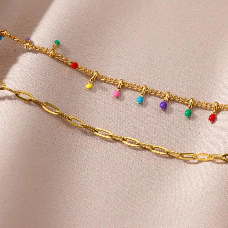 Chaîne de Cheville Dorée avec Croix et Pierres Zirconium