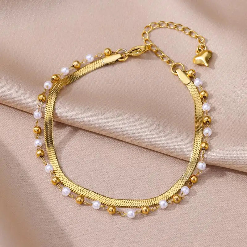 Chaîne de Cheville Dorée avec Croix et Pierres Zirconium