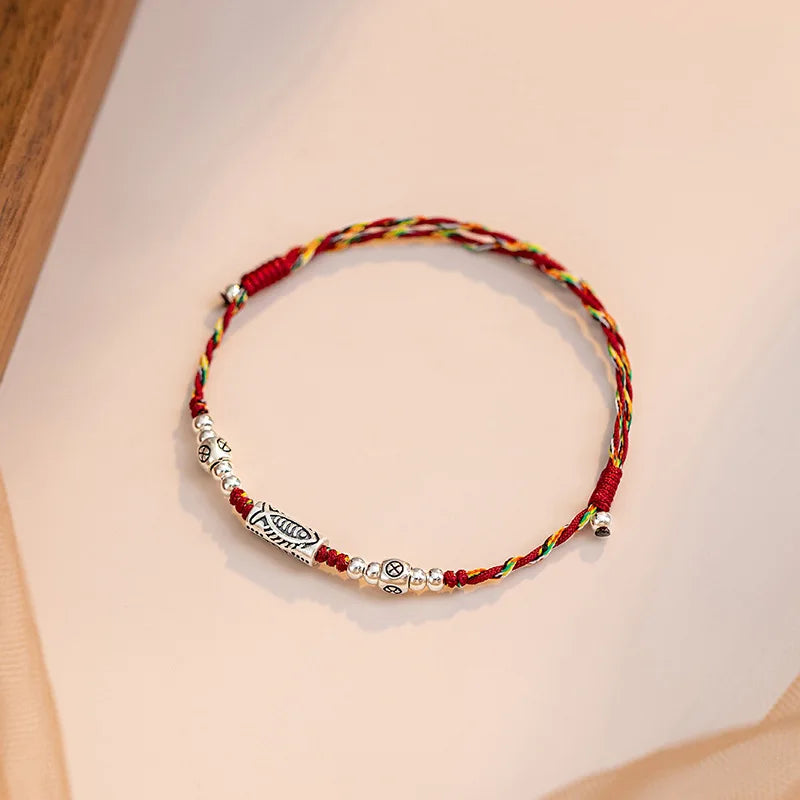 Chaîne de Cheville Tissé Rouge avec Papillon