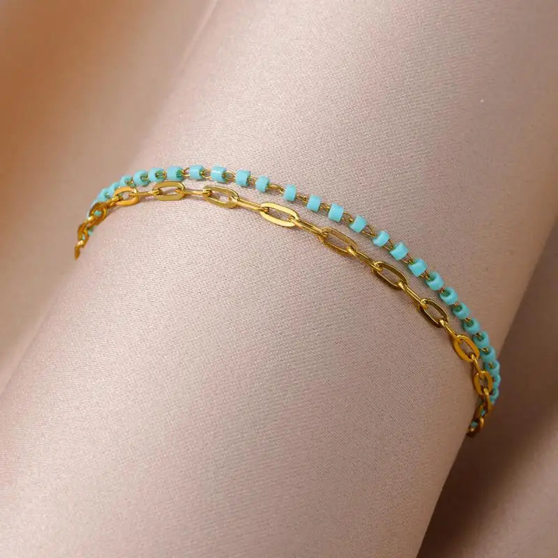 Chaîne de Cheville Dorée avec Croix et Pierres Zirconium