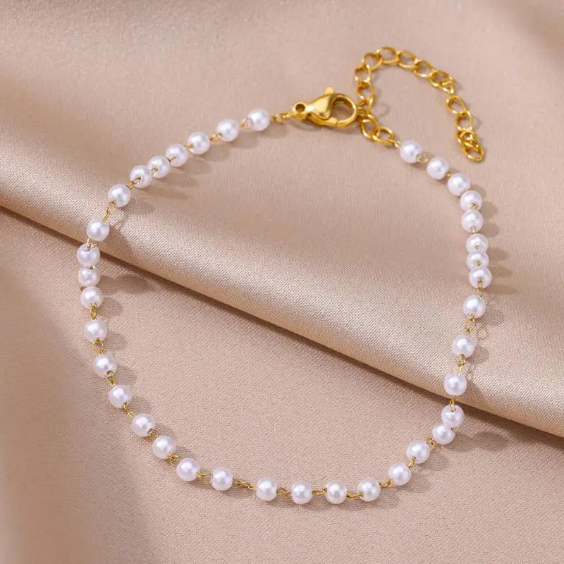 Chaîne de Cheville Dorée avec Croix et Pierres Zirconium