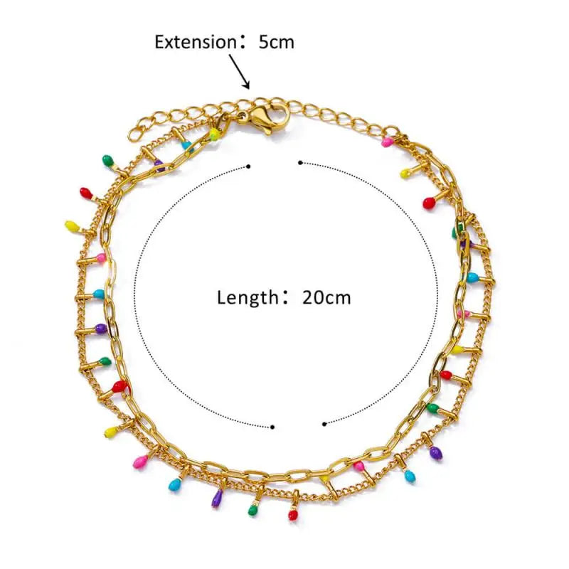 Chaîne de Cheville Dorée avec Croix et Pierres Zirconium