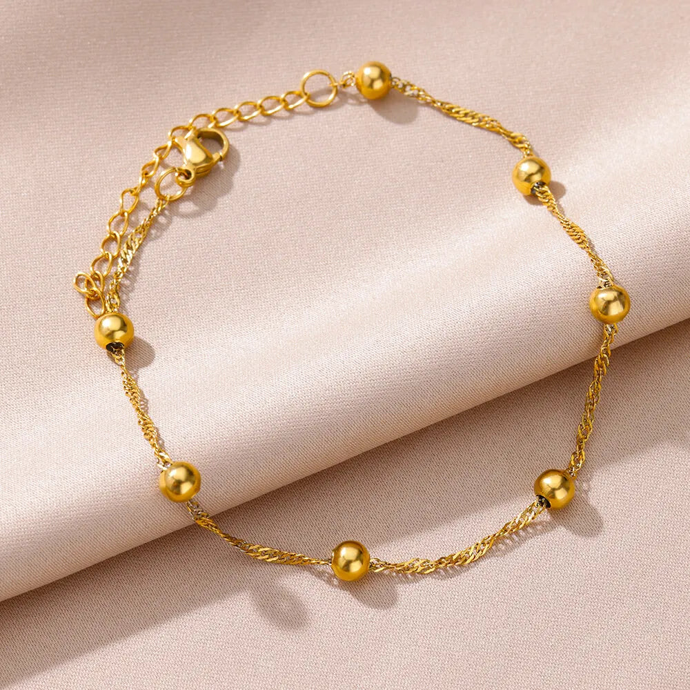 Chaîne de Cheville Dorée avec Croix et Pierres Zirconium