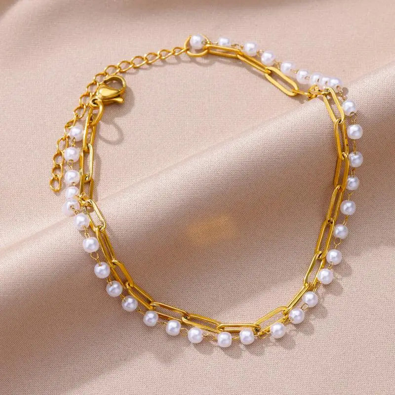 Chaîne de Cheville Dorée avec Croix et Pierres Zirconium