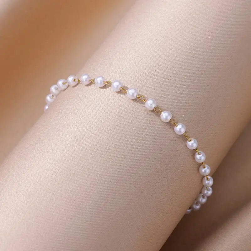 Chaîne de Cheville Dorée avec Croix et Pierres Zirconium