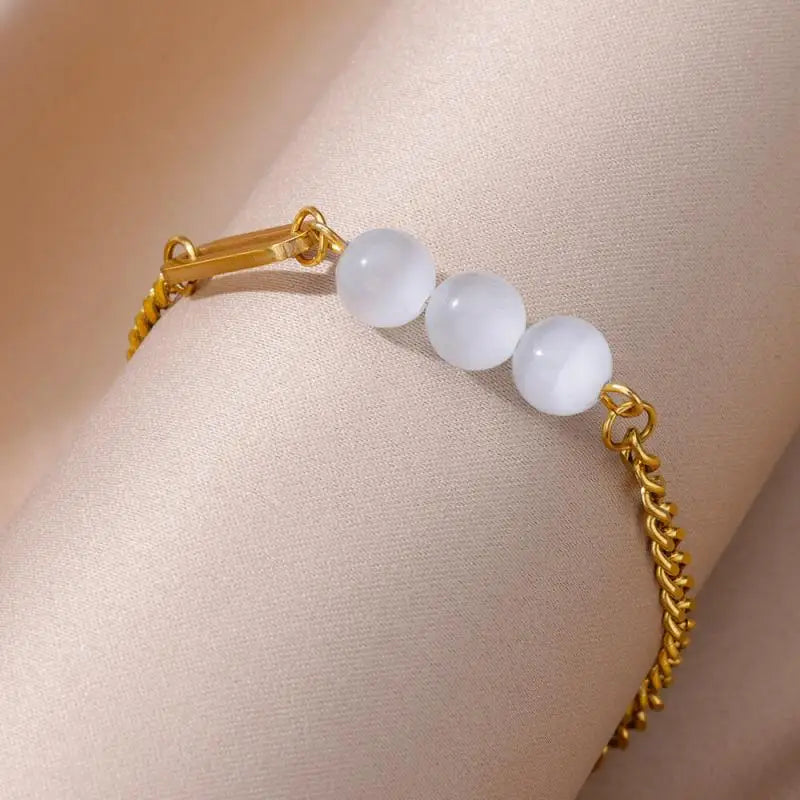 Chaîne de Cheville Dorée avec Croix et Pierres Zirconium
