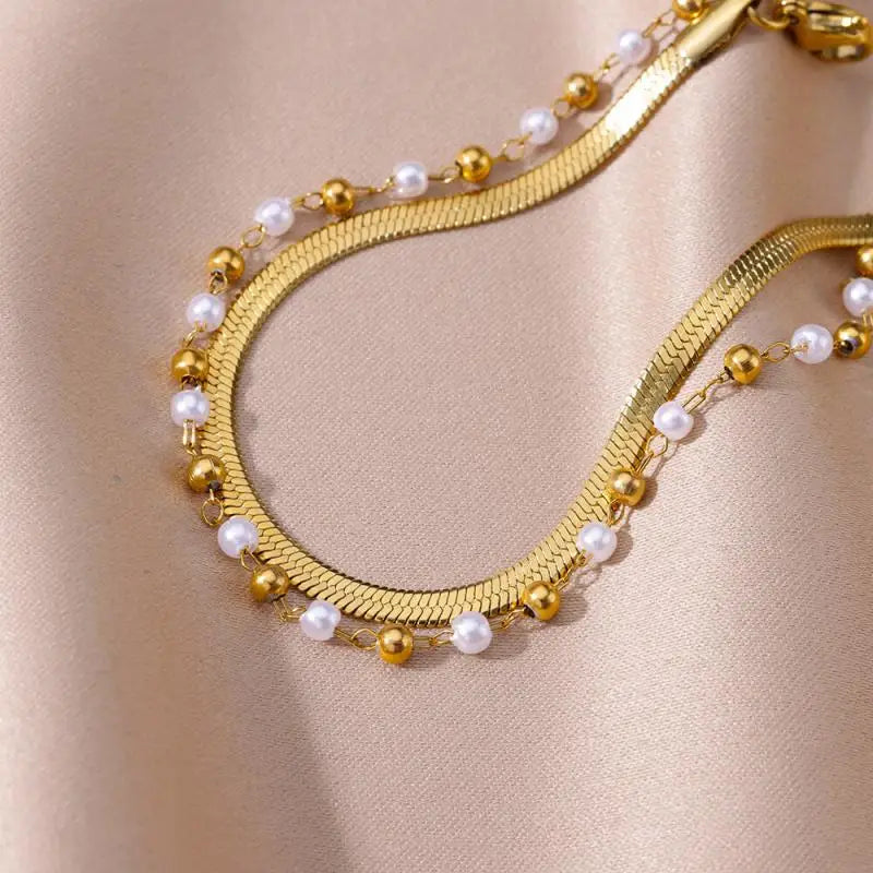 Chaîne de Cheville Dorée avec Croix et Pierres Zirconium
