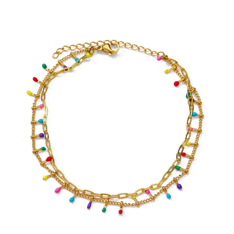 Chaîne de Cheville Dorée avec Croix et Pierres Zirconium