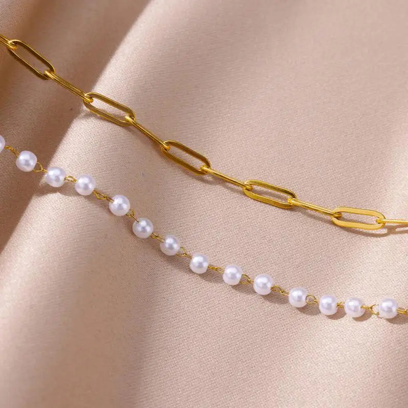 Chaîne de Cheville Dorée avec Croix et Pierres Zirconium
