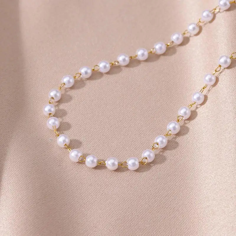 Chaîne de Cheville Dorée avec Croix et Pierres Zirconium