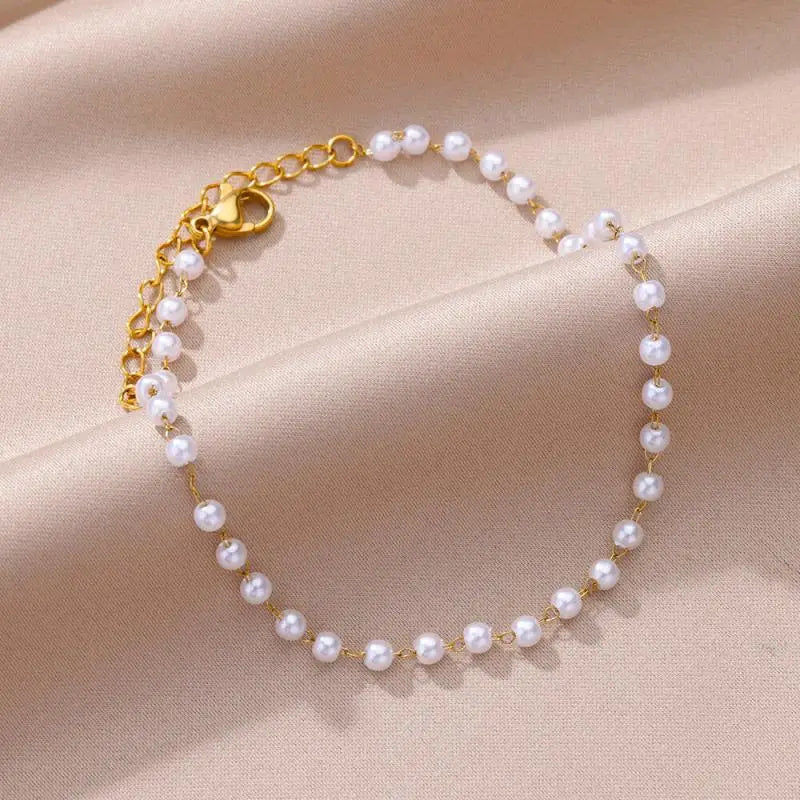 Chaîne de Cheville Dorée avec Croix et Pierres Zirconium