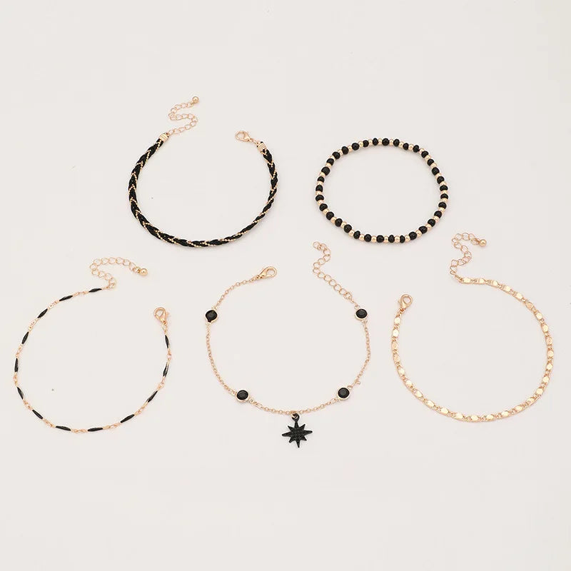 Chaîne de Cheville Multi-rangs Dorée et Noire