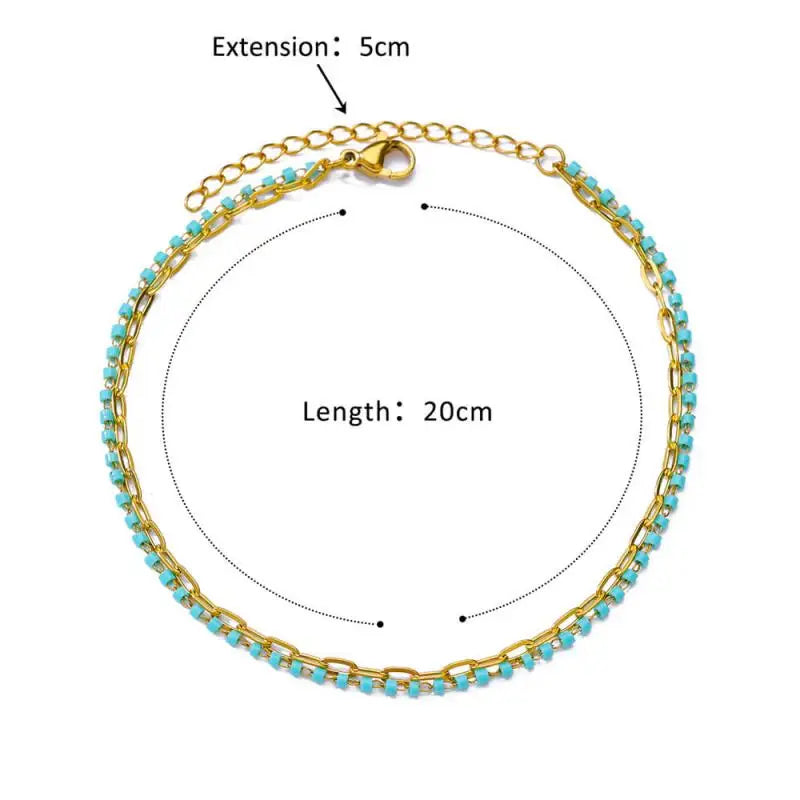 Chaîne de Cheville Dorée avec Croix et Pierres Zirconium